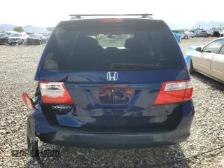 2006 Honda Odyssey EX z VIN 5FNRL38496B023830, wystawiony jako Copart lot #57497265 z przebiegiem 123 839 mil mil oraz Szkoda całkowita • Salvage title. Historia ofert i sprzedaży dostępna na DreamBid. Obrazek 6.