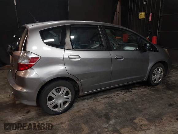 2010 Honda Fit with VIN JHMGE8H29AS020675, listed as a IAAI auction lot 41832465 with 212,713 mi miles. Bid and sale history available at carsss.com. Image 4.