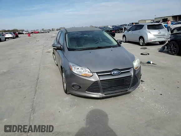 2013 Ford Focus SE z VIN 1FADP3F25DL149392, wystawiony jako Copart lot #82422434 z przebiegiem 169 525 mil mil oraz Szkody całkowita. Historia ofert i sprzedaży dostępna na DreamBid. Obrazek 11.