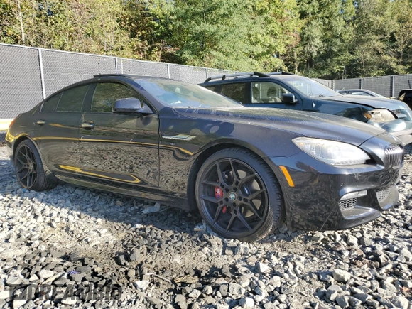 2014 BMW 6 Series 650i xDrive z VIN WBA6B4C54ED371520, wystawiony jako Copart lot #75107784 z przebiegiem 136 077 mil mil oraz Szkoda całkowita • Salvage title. Historia ofert i sprzedaży dostępna na DreamBid. Obrazek 4.