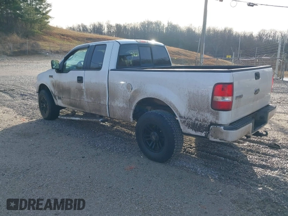 2005 Ford F-150 STX with VIN 1FTRX14W15NB34372, listed as a IAAI auction lot 41660412 with 104,086 mi miles. Bid and sale history available at carsss.com. Image 3.