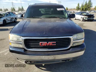 2004 GMC Yukon SLE with VIN 1GKEC13V84R179274, listed as a Copart auction lot 77367204 with 309,239 mi miles and Salvage Title. Bid and sale history available at carsss.com. Image 5.