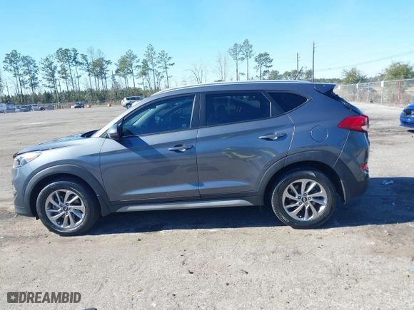2017 Hyundai Tucson SE Plus with VIN KM8J33A45HU420349, listed as a IAAI auction lot 41296190 with 77,910 mi miles. Bid and sale history available at carsss.com. Image 14.