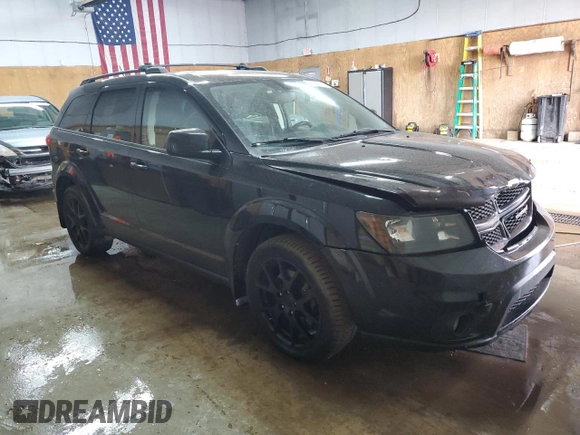 2013 Dodge Journey Crew with VIN 3C4PDCCG4DT693869, listed as a Copart auction lot 63666684 with 134,424 mi miles and Salvage title. Bid and sale history available at DreamBid. Image 4.