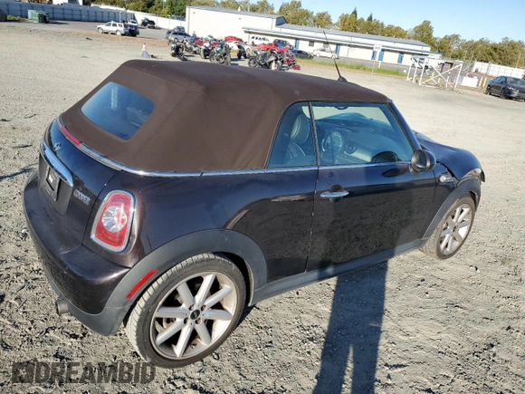 2015 MINI Convertible with VIN WMWZN3C53FT862859, listed as a Copart auction lot 71419764 with 113,356 mi miles and Salvage title. Bid and sale history available at DreamBid. Image 3.