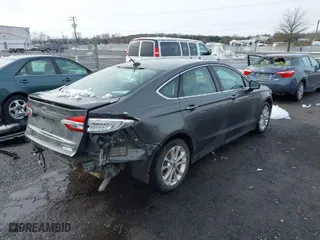 2019 Ford Fusion Energi Titanium with VIN 3FA6P0SU9KR227833, listed as a IAAI auction lot 41563968 with 77,567 mi miles. Bid and sale history available at carsss.com. Image 4.