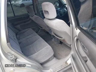 1997 Honda CR-V z VIN JHLRD1848VC057743, wystawiony jako IAAI lot #42259350 z przebiegiem 218 641 mil mil oraz . Historia ofert i sprzedaży dostępna na DreamBid. Obrazek 8.