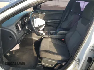 2015 Dodge Charger SE with VIN 2C3CDXBG2FH795792, listed as a Copart auction lot 51297775 with 115,690 mi miles and Salvage Title. Bid and sale history available at DreamBid. Image 7.