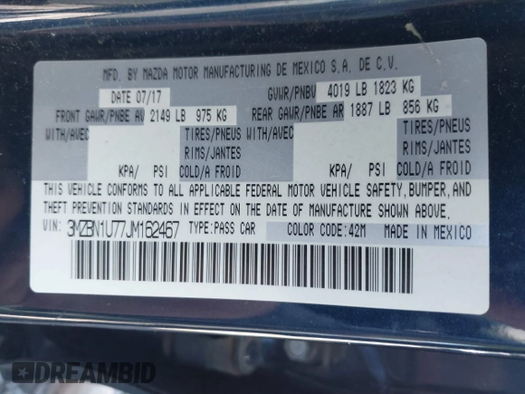 2018 Mazda 3 Sport with VIN 3MZBN1U77JM162467, listed as a IAAI auction lot 41821629 with 98,782 mi miles and . Bid and sale history available at DreamBid. Image 9.