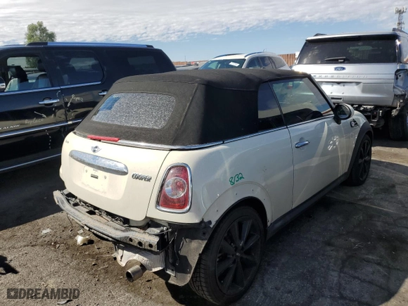 2014 MINI Cooper Convertible with VIN WMWZN3C59ET569823, listed as a Copart auction lot 72543194 with 56,730 mi miles and Salvage Title. Bid and sale history available at carsss.com. Image 3.