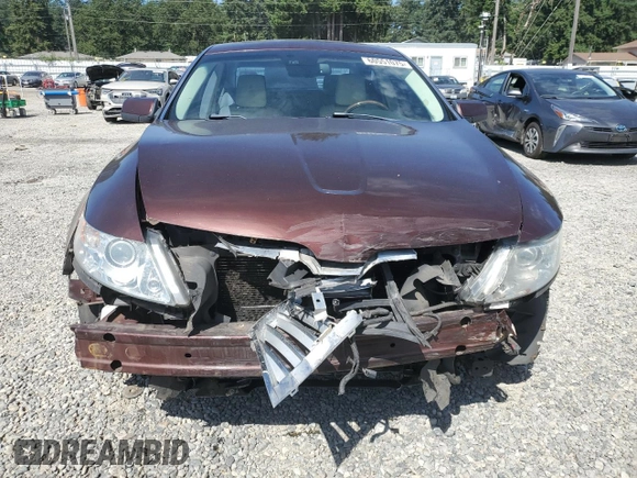 2009 Lincoln MKS z VIN 1LNHM94R89G601127, wystawiony jako Copart lot #60551075 z przebiegiem 102 000 mil mil oraz Szkoda całkowita • Salvage title. Historia ofert i sprzedaży dostępna na DreamBid. Obrazek 5.