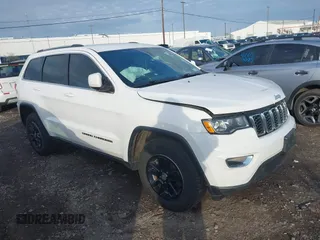 2018 Jeep Grand Cherokee Laredo E with VIN 1C4RJFAG6JC406061, listed as a IAAI auction lot 42046977 with 90,339 mi miles and . Bid and sale history available at DreamBid. Image 1.