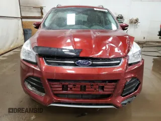 2016 Ford Escape Titanium with VIN 1FMCU9J95GUC57205, listed as a Copart auction lot 71033934 with 90,477 mi miles and Salvage Title. Bid and sale history available at DreamBid. Image 5.