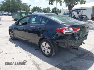 2018 Kia Forte LX z VIN 3KPFK4A70JE197056, wystawiony jako IAAI lot #42435555 z przebiegiem 79 805 mil mil oraz . Historia ofert i sprzedaży dostępna na DreamBid. Obrazek 3.