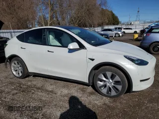 2023 Tesla Model Y Long Range z VIN 7SAYGAEE2PF758235, wystawiony jako Copart lot #49059895 z przebiegiem 57 615 mil mil oraz Czysty tytuł • Clean title. Historia ofert i sprzedaży dostępna na DreamBid. Obrazek 4.