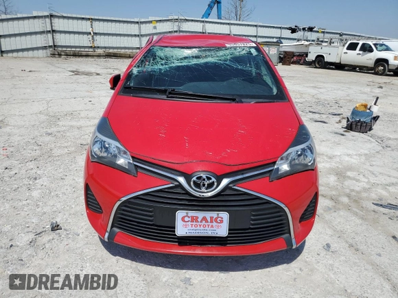 2015 Toyota Yaris L with VIN VNKJTUD34FA022097, listed as a Copart auction lot 53857825 with 106,680 mi miles and Salvage title. Bid and sale history available at DreamBid. Image 5.