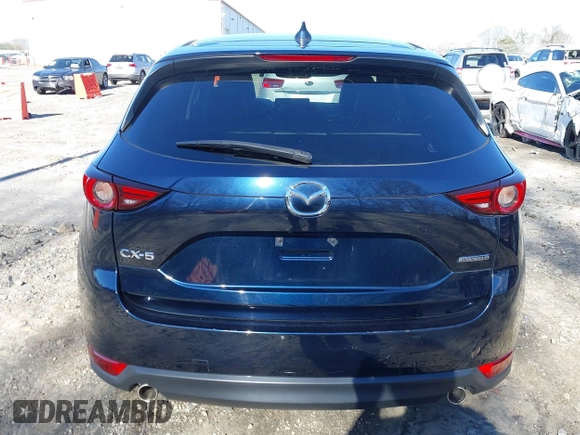 2021 Mazda CX-5 Grand Touring with VIN JM3KFADM5M0428279, listed as a IAAI auction lot 41747175 with 49,579 mi miles. Bid and sale history available at carsss.com. Image 17.