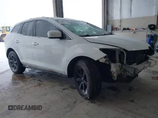 2011 Mazda CX-7 i SV with VIN JM3ER2AM6B0409168, listed as a IAAI auction lot 41573634 with 135,238 mi miles. Bid and sale history available at carsss.com. Image 1.