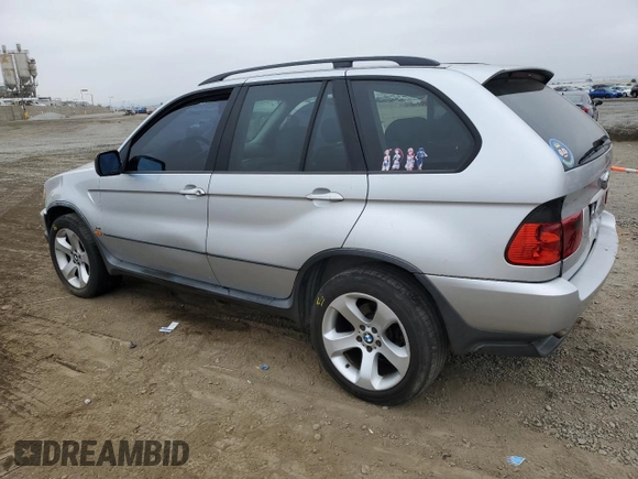 2003 BMW X5 3.0i with VIN 5UXFA53573LV98293, listed as a Copart auction lot 69780404 with 0 mi miles and Salvage Title. Bid and sale history available at carsss.com. Image 2.