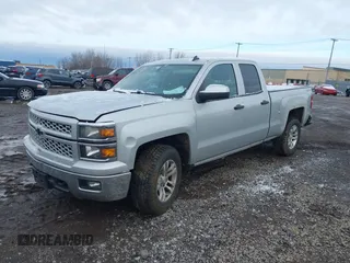 2014 Chevrolet Silverado 1500 LT with VIN 1GCVKREC5EZ115459, listed as a IAAI auction lot 41143910 with 275,008 mi miles and . Bid and sale history available at DreamBid. Image 16.