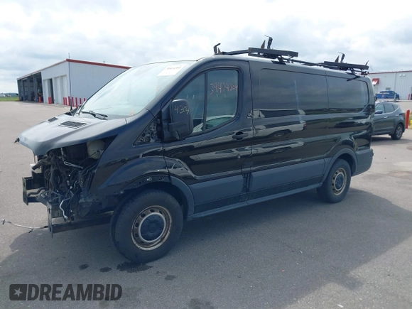 2015 Ford Transit Cargo with VIN 1FTYE1YM9FKA27910, listed as a IAAI auction lot 39414304 with 156,451 mi miles and . Bid and sale history available at DreamBid. Image 2.