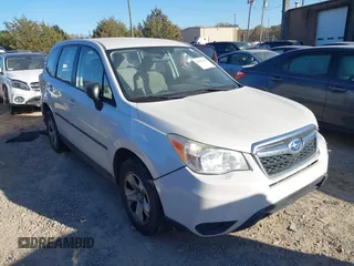 2014 Subaru Forester 2.5i with VIN JF2SJAAC4EG414600, listed as a IAAI auction lot 41006289 with 128,611 mi miles. Bid and sale history available at carsss.com. Image 1.