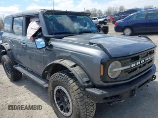 2022 Ford Bronco z VIN 1FMEE5DP3NLB03118, wystawiony jako IAAI lot #42096181 z przebiegiem 62 685 mil mil oraz . Historia ofert i sprzedaży dostępna na DreamBid. Obrazek 1.