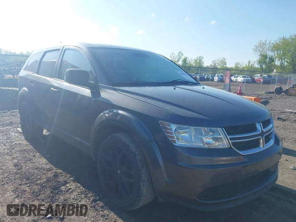 2015 Dodge Journey SE z VIN 3C4PDCAB4FT675074, wystawiony jako IAAI lot #42059878 z przebiegiem 99 947 mil mil oraz . Historia ofert i sprzedaży dostępna na DreamBid. Obrazek 1.