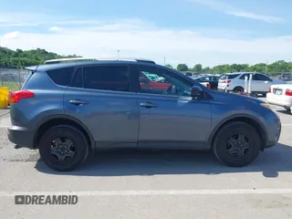 2014 Toyota RAV4 LE with VIN 2T3ZFREV1EW093290, listed as a IAAI auction lot 42343278 with 318,635 mi miles and . Bid and sale history available at DreamBid. Image 13.