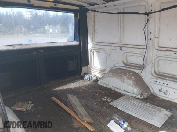 1998 Chevrolet Astro Cargo z VIN 1GCDM19WXWB192883, wystawiony jako IAAI lot #42538209 z przebiegiem 162 623 mil mil oraz . Historia ofert i sprzedaży dostępna na DreamBid. Obrazek 8.