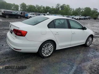 2015 Volkswagen Jetta SE with VIN 3VWD17AJ9FM233571, listed as a Copart auction lot 61436735 with 58,690 mi miles and Salvage title. Bid and sale history available at DreamBid. Image 3.
