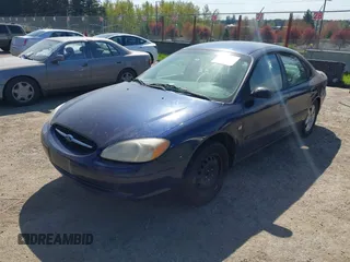 2000 Ford Taurus SES with VIN 1FAFP55S7YA240929, listed as a IAAI auction lot 42040583 with 179,159 mi miles and . Bid and sale history available at DreamBid. Image 2.