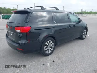 2015 Kia Sedona EX with VIN KNDMC5C11F6038255, listed as a IAAI auction lot 41968284 with 130,765 mi miles. Bid and sale history available at carsss.com. Image 4.