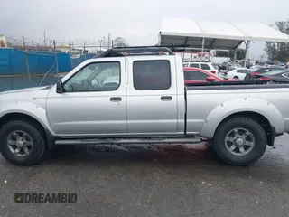 2004 Nissan Frontier XE z VIN 1N6ED29X04C423328, wystawiony jako IAAI lot #41514717 z przebiegiem 297 128 mil mil oraz . Historia ofert i sprzedaży dostępna na DreamBid. Obrazek 15.