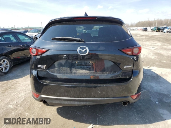 2019 Mazda CX-5 Grand Touring with VIN JM3KFBDM4K0550991, listed as a Copart auction lot 46368974 with 89,212 mi miles and Salvage Title. Bid and sale history available at carsss.com. Image 6.
