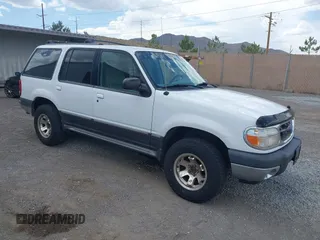 2000 Ford Explorer XLT z VIN 1FMDU73E6YZB38828, wystawiony jako IAAI lot #42458837 z przebiegiem 190 053 mil mil oraz . Historia ofert i sprzedaży dostępna na DreamBid. Obrazek 1.