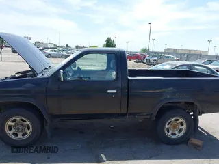 1991 Nissan Frontier XE with VIN 1N6SD11YXMC416937, listed as a IAAI auction lot 42660772 with 310,699 mi miles and . Bid and sale history available at DreamBid. Image 6.