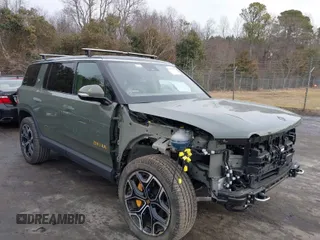 2022 Rivian R1S Launch Edition with VIN 7PDSGABL9NN002978, listed as a IAAI auction lot 41465140 with 32,453 mi miles. Bid and sale history available at carsss.com. Image 1.