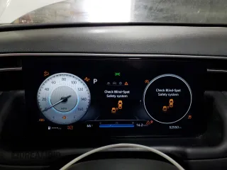 2023 Hyundai Tucson SEL z VIN 5NMJFCAE7PH284509, wystawiony jako Copart lot #60258975 z przebiegiem 52 550 mil mil oraz Szkoda całkowita • Salvage title. Historia ofert i sprzedaży dostępna na DreamBid. Obrazek 9.