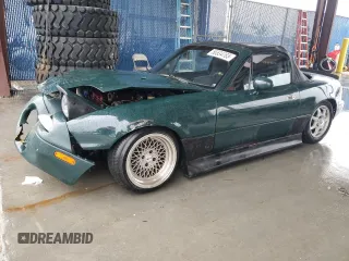 1991 Mazda MX-5 Miata Special Edition z VIN JM1NA3510M0232660, wystawiony jako Copart lot #56534765 z przebiegiem 181 986 mil mil oraz Szkoda całkowita • Salvage title. Historia ofert i sprzedaży dostępna na DreamBid. Obrazek 1.
