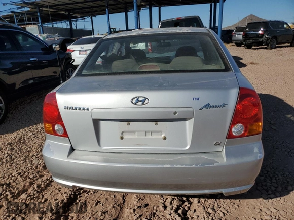 2003 Hyundai Accent GL with VIN KMHCG45CX3U429660, listed as a Copart auction lot 43824125 with 0 mi miles and Salvage Title. Bid and sale history available at carsss.com. Image 6.