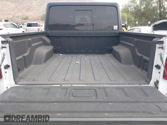 2021 Jeep Gladiator Willys с VIN 1C6HJTAG6ML619730, выставлен на аукционе IAAI как лот 41172494 с пробегом 40 360 миль миль и . История ставок и продаж доступна на DreamBid. Изображение 17.