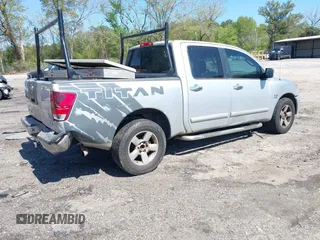 2004 Nissan Titan LE with VIN 1N6AA07AX4N575552, listed as a IAAI auction lot 41994360 with 258,524 mi miles and . Bid and sale history available at DreamBid. Image 4.