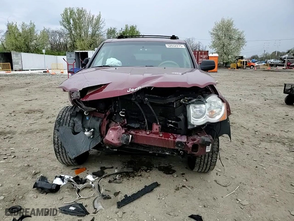 2008 Jeep Grand Cherokee Laredo with VIN 1J8GR48K68C240142, listed as a Copart auction lot 52652275 with 185,437 mi miles and Salvage Title. Bid and sale history available at carsss.com. Image 12.