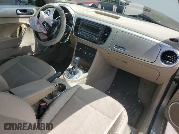 2015 Volkswagen Beetle 1.8T с VIN 3VW517AT5FM804169, выставлен на аукционе Copart как лот 65981544 с пробегом 104 754 миль миль и Списание • Salvage title. История ставок и продаж доступна на DreamBid. Изображение 8.