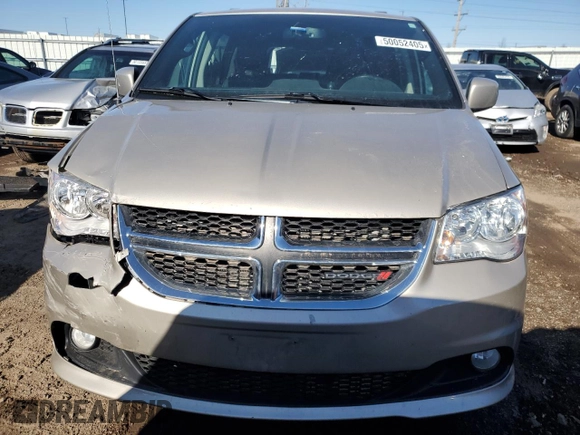 2016 Dodge Grand Caravan SXT with VIN 2C4RDGCG5GR219517, listed as a Copart auction lot 50052405 with 104,552 mi miles and Salvage Title. Bid and sale history available at DreamBid. Image 5.