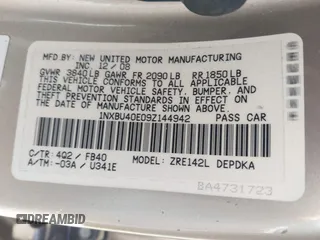 2009 Toyota Corolla with VIN 1NXBU40E09Z144942, listed as a IAAI auction lot 42051178 with 101,564 mi miles and . Bid and sale history available at DreamBid. Image 9.