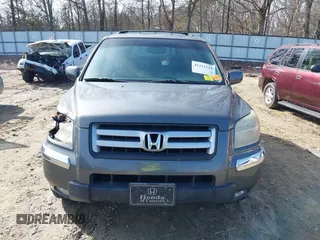 2007 Honda Pilot EX-L with VIN 5FNYF28737B001928, listed as a IAAI auction lot 41311134 with 243,870 mi miles. Bid and sale history available at carsss.com. Image 12.