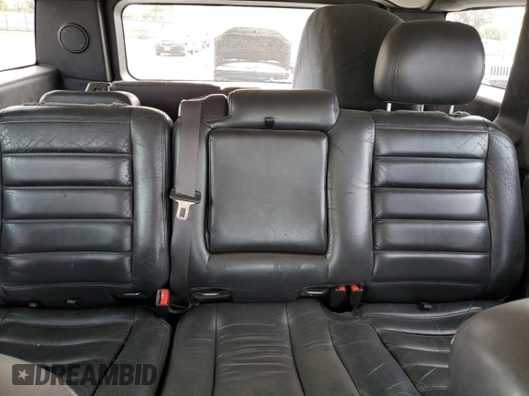 2005 Hummer H2 SUV with VIN 5GRGN23UX5H115383, listed as a Copart auction lot 71682984 with 157,405 mi miles and Salvage Title. Bid and sale history available at carsss.com. Image 10.