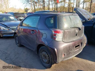 2014 Scion iQ with VIN JTNJJXB09EJ030215, listed as a IAAI auction lot 41329143 with 126,954 mi miles. Bid and sale history available at carsss.com. Image 3.